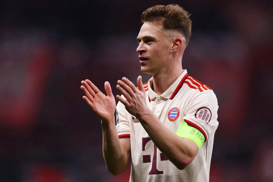 FILE PHOTO: Soccer Football - Champions League - Round of 16 - Second Leg - Bayer Leverkusen v Bayern Munich - BayArena, Leverkusen, Germany - March 11, 2025 Bayern Munich's Joshua Kimmich celebrates after winning the match REUTERS/Thilo Schmuelgen/File Photo