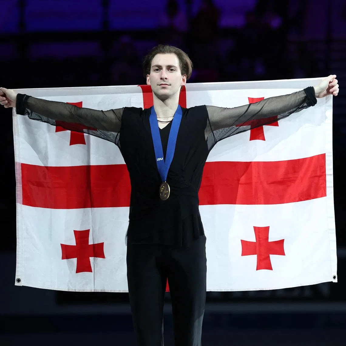 Figure Skating - ISU Figure Skating European Championships - Sheffield Arena, Sheffield, Britain - January 17, 2026 Georgia's Nika Egadze celebrates on the podium after winning the Men's Figure Skating Action Images via Reuters/Andrew Boyers