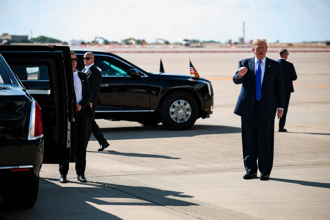 U.S. President Donald Trump makes a fist before boarding his motorcade upon arrival at Dallas-Fort Worth International Airport to attend the Republican National Midterm Convention in Dallas, Texas, U.S., September 9, 2026. REUTERS/Evan Vucci