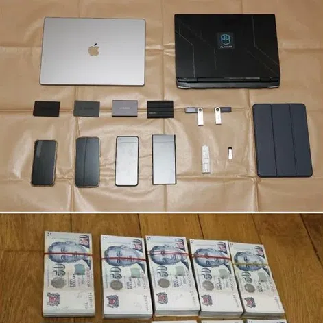 Electronic devices and cash seized from simultaneous raids at multiple locations on Sept 9 which led to the arrests of the six men.