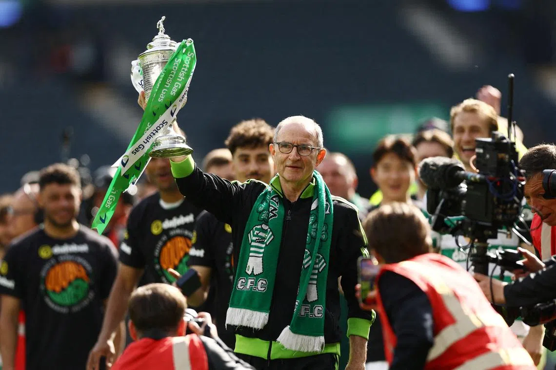 FILE PHOTO: Soccer Football - Scottish Cup - Final - Celtic v Dunfermline Athletic - Hampden Park, Glasgow, Scotland, Britain - May 23, 2026 Celtic manager Martin O'Neill celebrates with the trophy after winning the Scottish Cup Action Images via Reuters/Lee Smith/File Photo