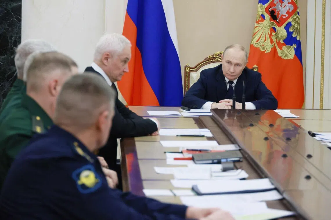 Russian President Vladimir Putin chairing a meeting on Russia's invasion of Ukraine on Dec 29.