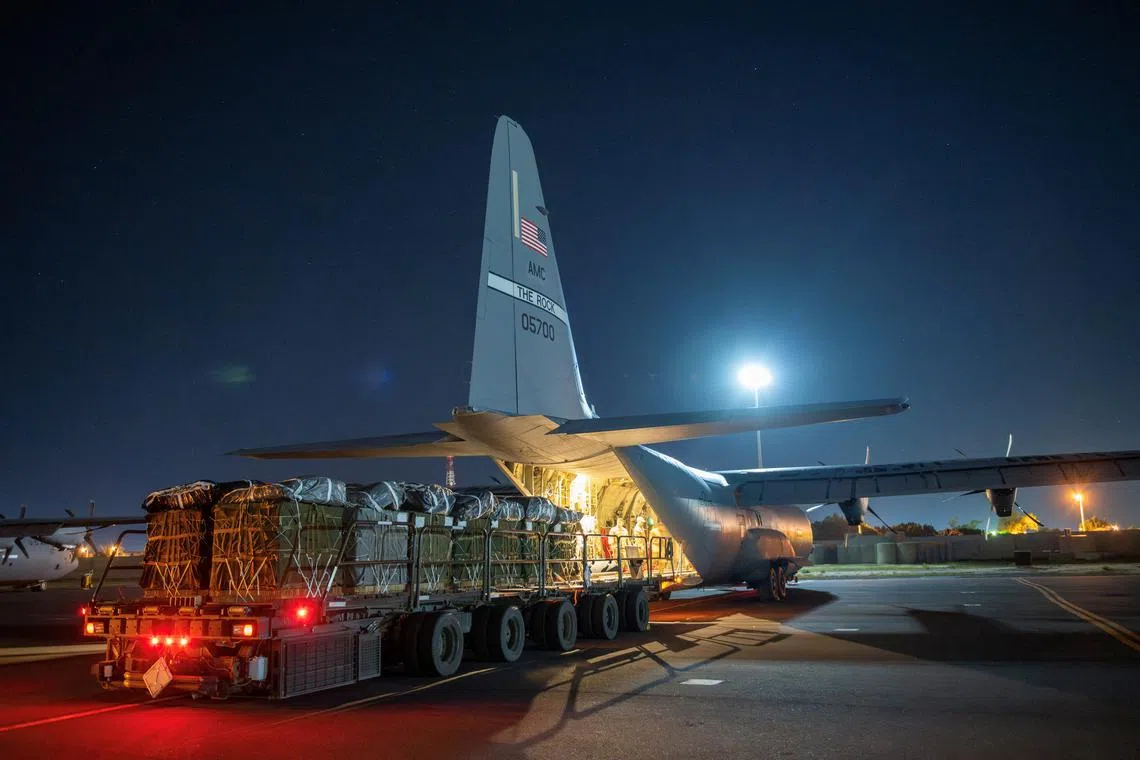 Over 38,000 Meals Ready to Eat and water destined for an airdrop over Gaza are loaded aboard a U.S. Air Force C-130J Super Hercules at an undisclosed location in Southwest Asia, March 1, 2024.  U.S. Air Force/Handout via REUTERS