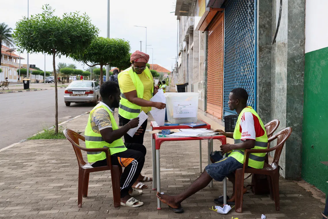FILE PHOTO: Election officials count ballots for the constitutional referendum at a polling station after voting closed in Bissau, Guinea-Bissau, August 30, 2026. REUTERS/Stringer/File Photo