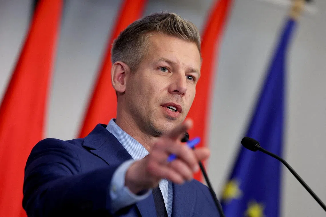 FILE PHOTO: Election winner Peter Magyar speaks during a press conference in Budapest, Hungary, April 20, 2026. REUTERS/Bernadett Szabo/File Photo
