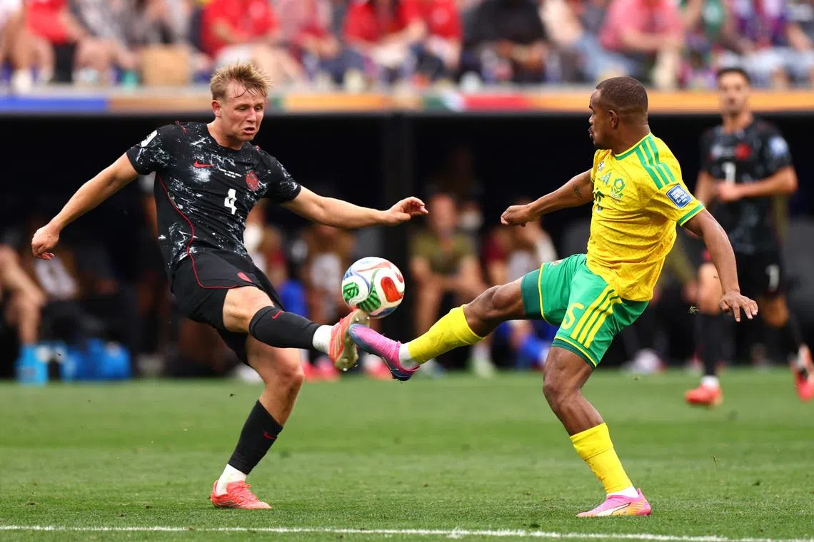 Soccer Football - FIFA World Cup 2026 - Round of 32 - South Africa v Canada - Los Angeles Stadium, Inglewood, California, U.S. - June 28, 2026 Canada's Luc de Fougerolles in action with South Africa's Iqraam Rayners IMAGN IMAGES via Reuters/Jessie Alcheh