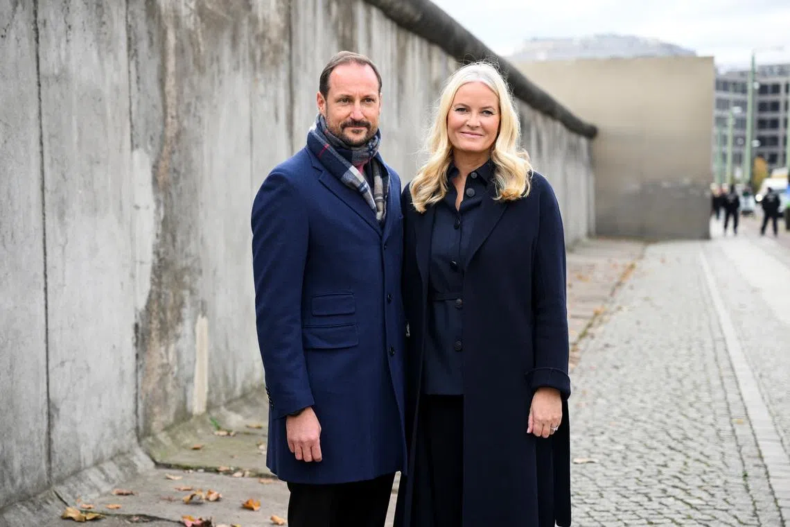 Norway's Crown Prince Haakon and Crown Princess Mette-Marit pose as they attend a memorial ceremony marking the 34th anniversary of the fall of the Berlin Wall at Bernauer Strasse in Berlin, Germany, November 9, 2023. REUTERS/Annegret Hilse/File Photo