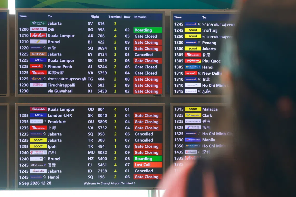 Information boards showing cancelled flights to Jakarta seen at Changi Airport Terminal 3 on Sept 6.