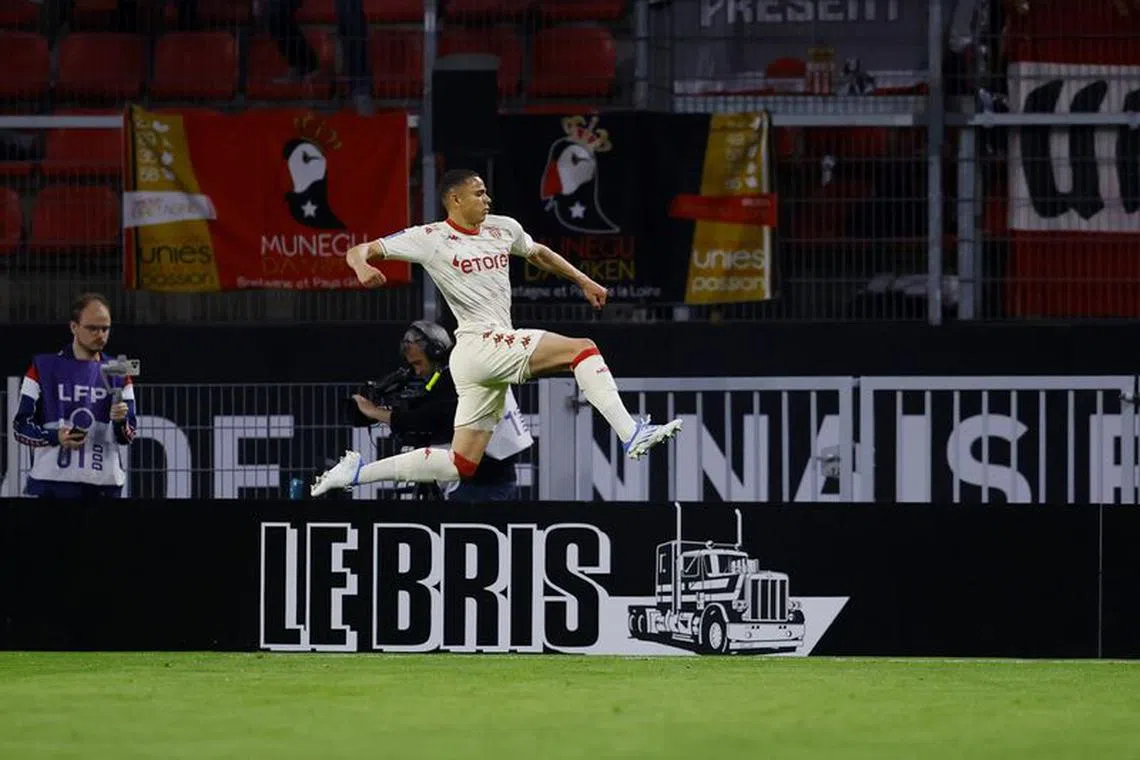 FILE PHOTO: Soccer Football - Ligue 1 - Stade Rennes v AS Monaco - Roazhon Park, Rennes, France - April 15, 2022 AS Monaco's Vanderson celebrates scoring their first goal with teammates REUTERS/Stephane Mahe/File Photo