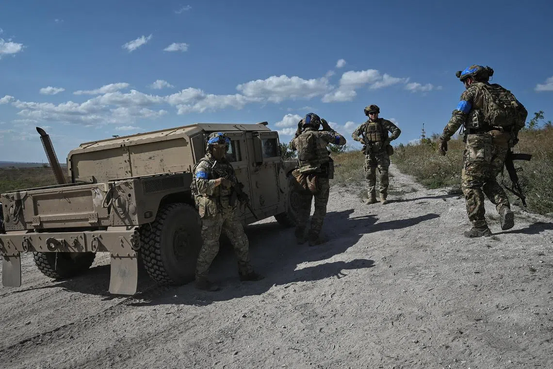 Ukrainian forces had retaken close to 2 sq km of land in the past week around the shattered eastern city of Bakhmut, said the country's deputy defence minister.
