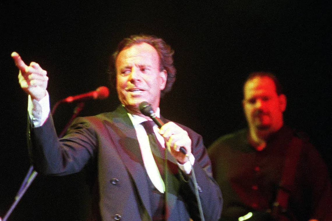 Two women allege they suffered sexual abuse and forced labour while working at the Spanish singer Julio Iglesias’ properties.