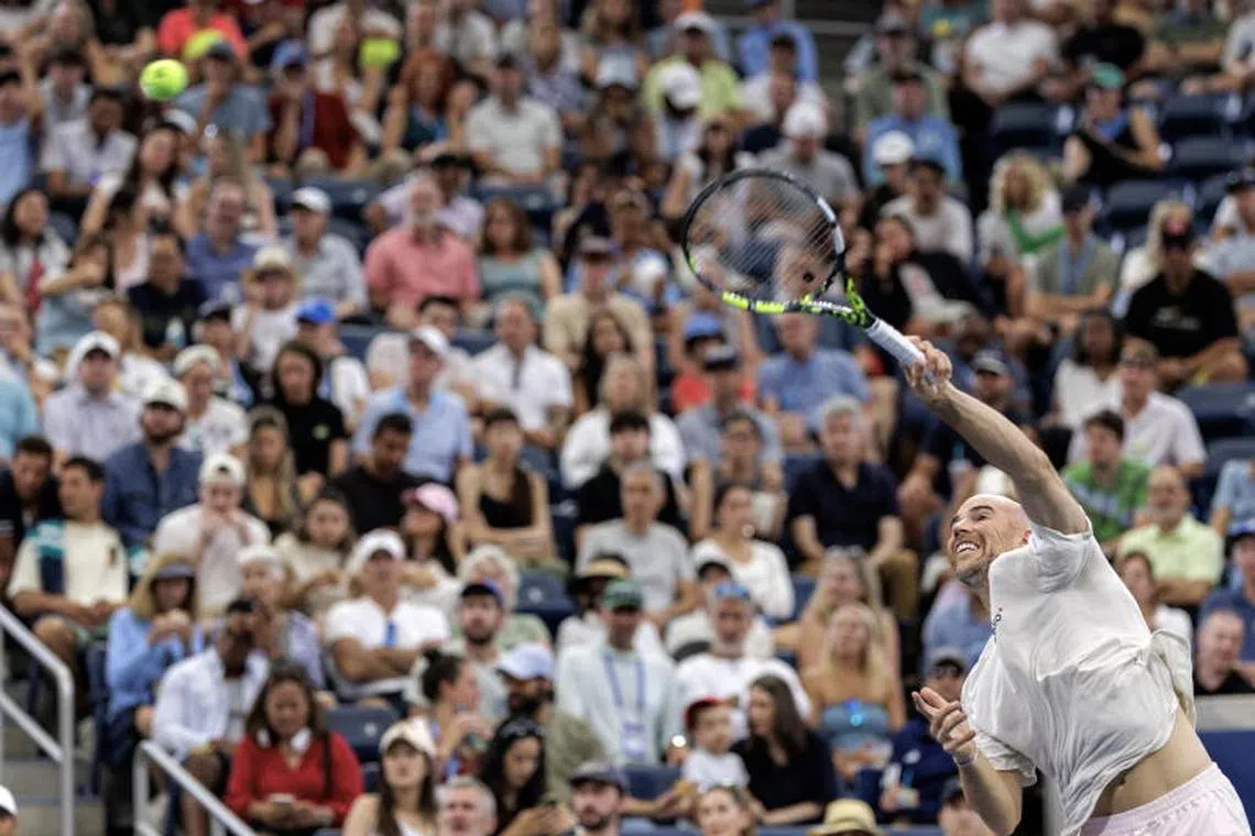 Adrian Mannarino of France in action against Ben Shelton of the US during the third round of the US Open at the USTA Billie Jean King National Tennis Centre.