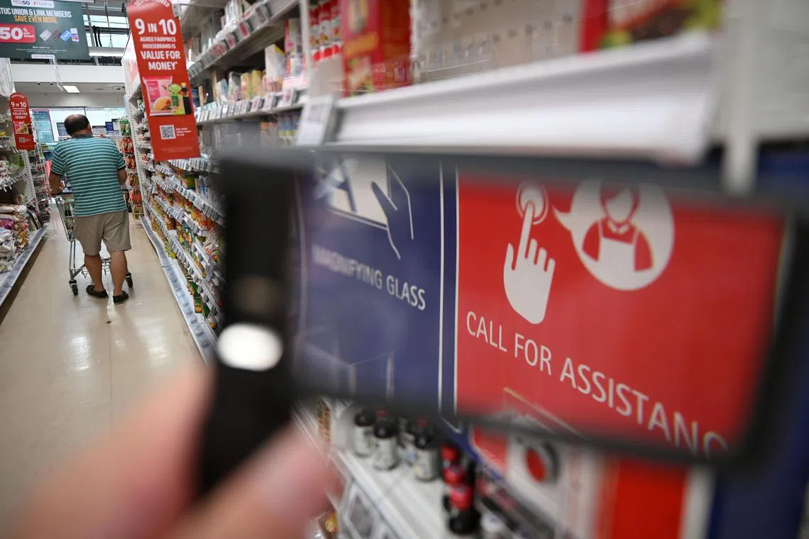 ST20230911_202370760528/sffp11/Shintaro Tay/Chin Soo Fang/
Magnifying glass and a button to call for assistance at the FairPrice outlet at Enabling Village in Lengkok Bahru on Sep 11, 2023.
ST Exclusive - The FairPrice outlet at Enabling Village in Lengkok Bahru will close its doors in Oct. Launched on Dec 2 in 2015, this was FairPrice’s first “Enabled Store” designed to meet the needs of Singapore’s rapidly ageing population and support persons with disabilities to live actively and independently. It has special features like wheelchair friendly trolleys and magnifying glasses. Customers ST spoke to did not know about the impending closure but were not surprised given the low footfall.