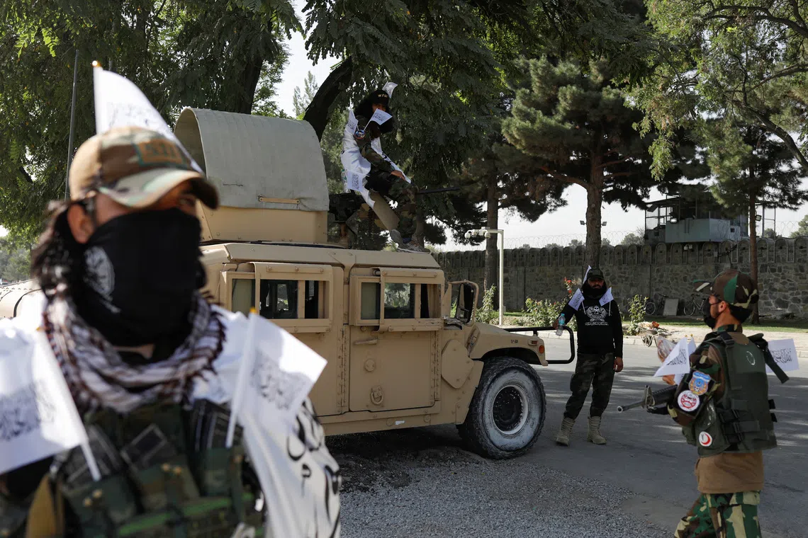 FILE PHOTO: Taliban soldiers stand guard on a street in Kabul, Afghanistan, August 15, 2023. REUTERS/Ali Khara/File Photo