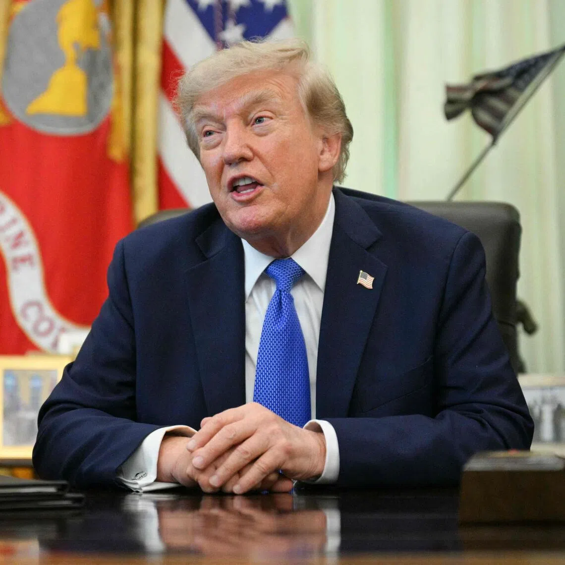 US President Donald Trump addressing the media after signing executive orders at the White House on Aug 7.
