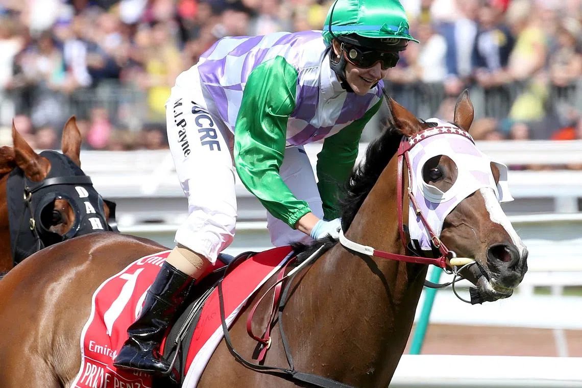 FILE PHOTO: Prince of Penzance ridden by Michelle Payne (green cap) wins race 7 the Melbourne Cup during the Melbourne Cup race day at Flemington Racecourse in Melbourne, Victoria November 3, 2015. REUTERS/Hamish Blair/File Photo