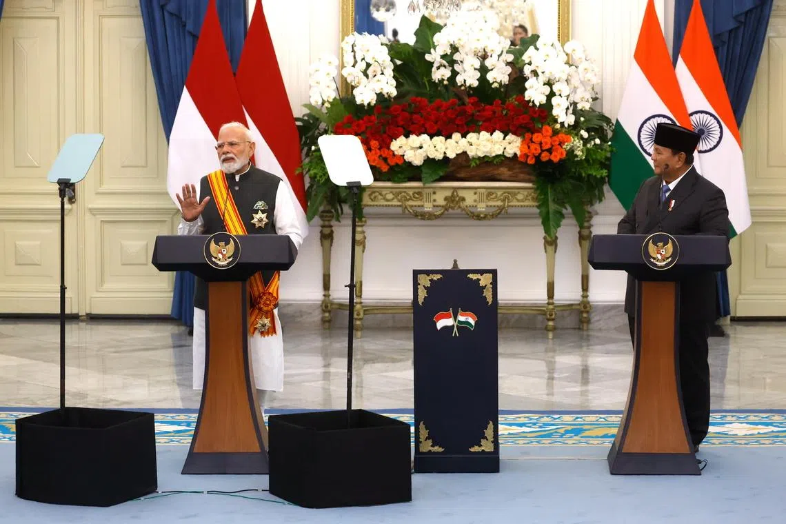 Indian PM Narendra Modi (left)and Indonesia’s President Prabowo Subianto during a joint press conference following their meeting at Merdeka Palace in Jakarta, on July 7.