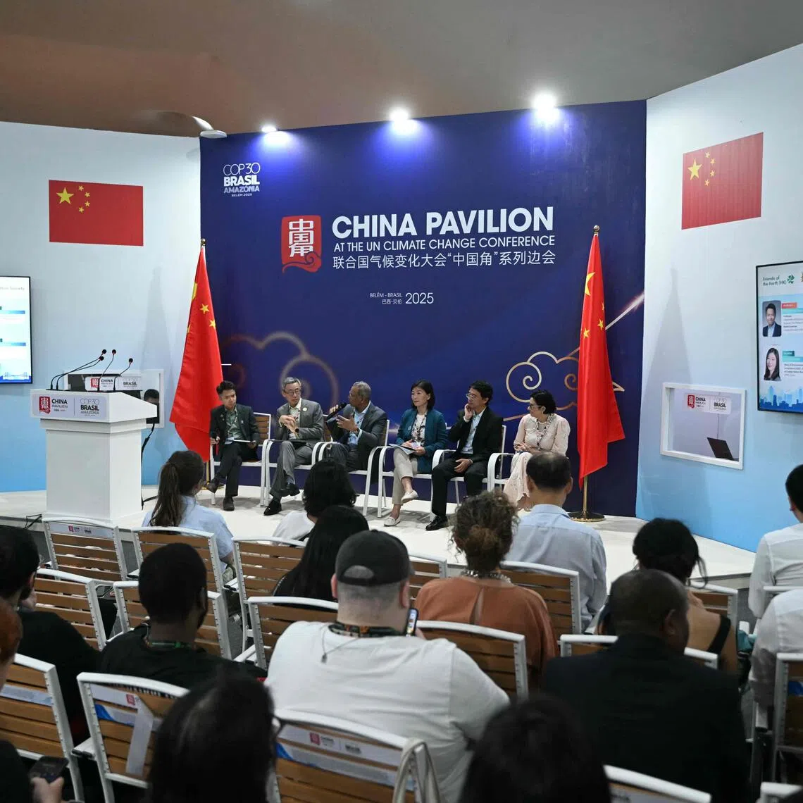 People attending a panel discussion at the China Pavillion during the COP30 UN Climate Change Conference in Belem, Brazil on Nov 11.