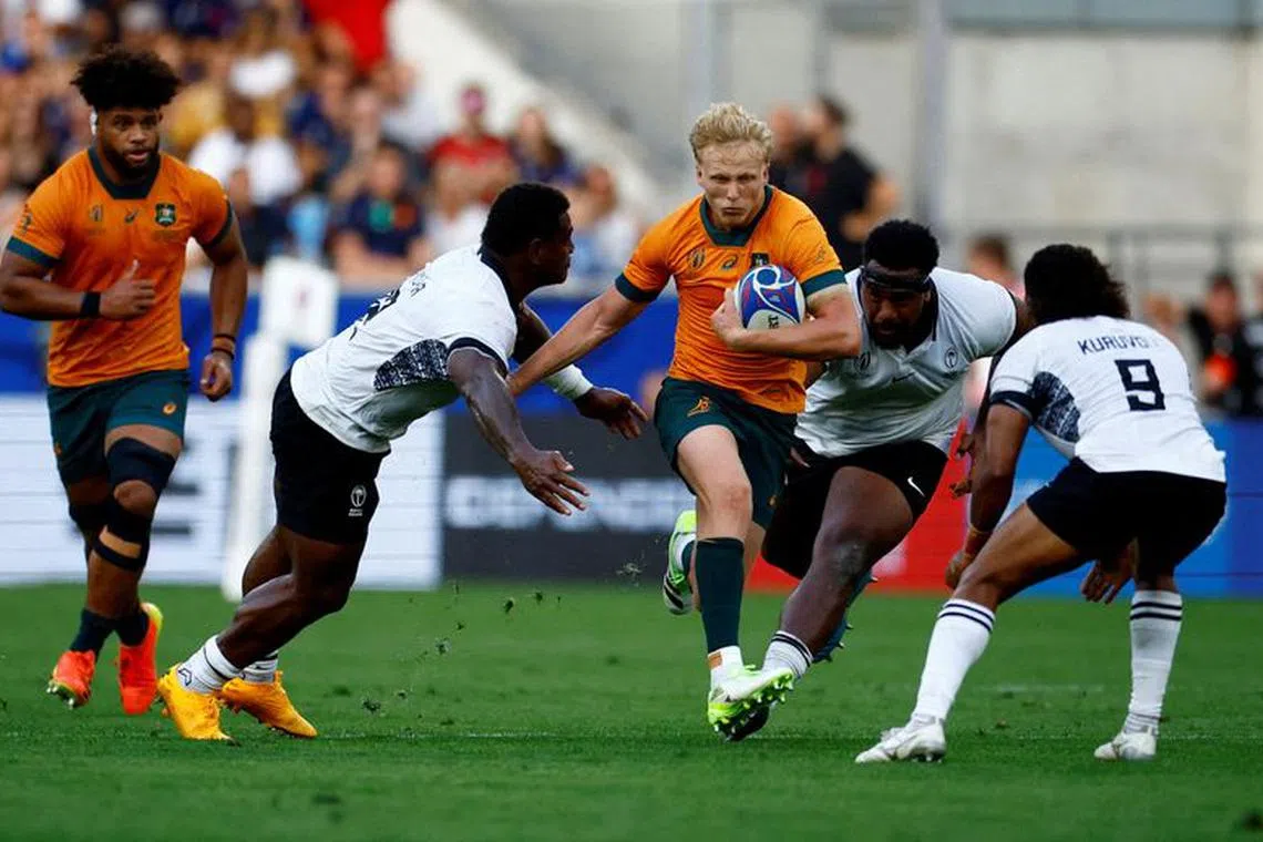 FILE PHOTO: Rugby Union - Rugby World Cup 2023 - Pool C - Australia v Fiji - Stade Geoffroy-Guichard, Saint-Etienne, France - September 17, 2023  Australia's Carter Gordon in action REUTERS/Sarah Meyssonnier/File Photo