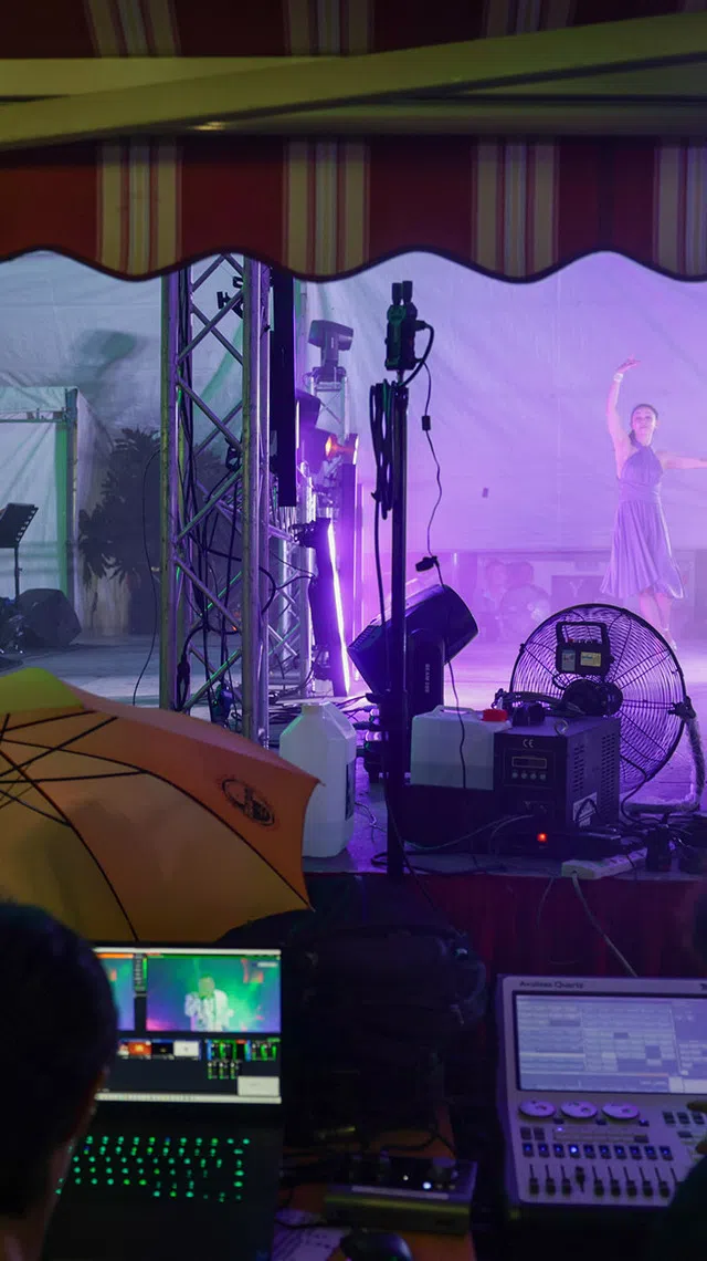 ST20260816_202670800792/Jasel Poh/sfghost/

Show staff working the livestream behind the scenes as dancers perform for the attendees on Aug 16, 2026.
