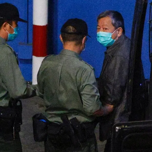 Pro-democracy activist Lee Cheuk-yan arrives at Lai Chi Kok Reception Centre by prison van after being sentenced for unauthorised assembly, in Hong Kong, China April 16, 2021. REUTERS/Tyrone Siu
