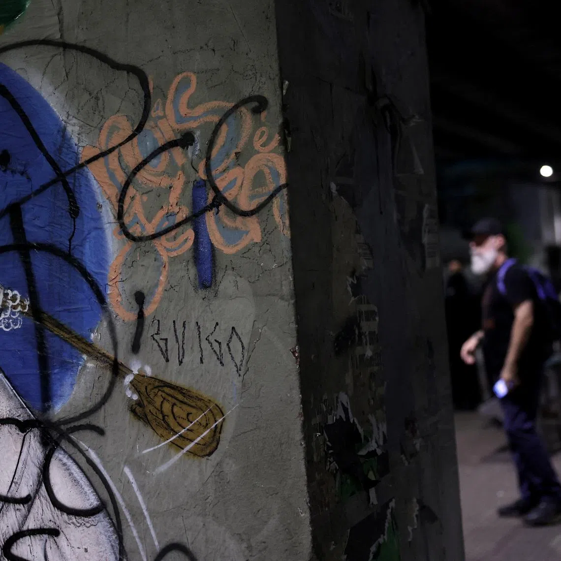People walk past graffiti reading \"PCC\", referring to Brazilian drug gang Primeiro Comando da Capital, after U.S. Secretary of State Marco Rubio announced a policy to designate \"PCC\" and Comando Vermelho \"CV\" as foreign \"terrorist organizations\", in Sao Paulo, Brazil, May 31, 2026. REUTERS/Amanda Perobelli