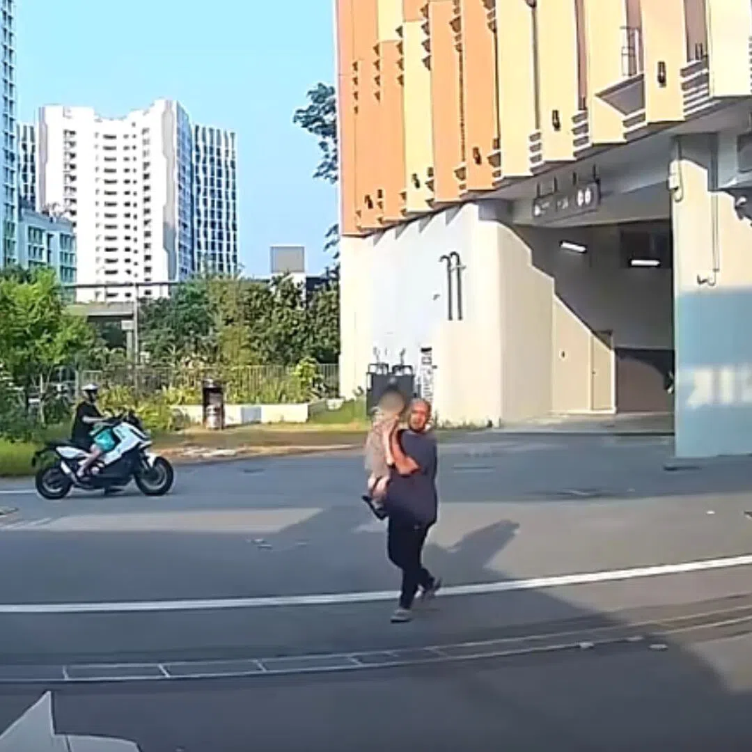 The child is seen in a video walking alone across a zebra crossing and heading to the road ahead.