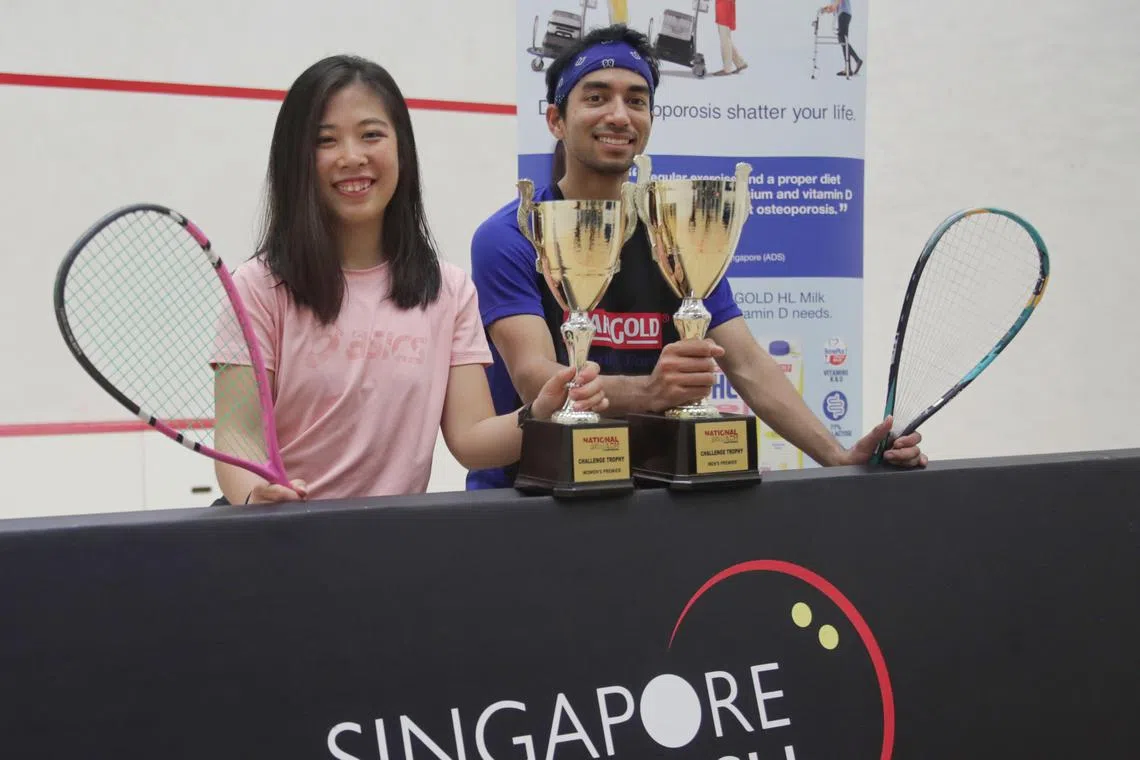 Samuel Kang (left) and Au Yeong Wai Yhann snagged their sixth consecutive men’s and women’s title respectively in the Marigold Singapore Squash Championships on Saturday. 