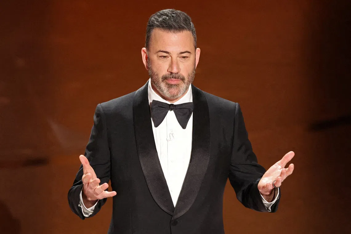 FILE PHOTO: Show host Jimmy Kimmel delivers his opening monologue at the 96th Academy Awards in Hollywood, Los Angeles, California, U.S., March 10, 2024. REUTERS/Mike Blake/File Photo