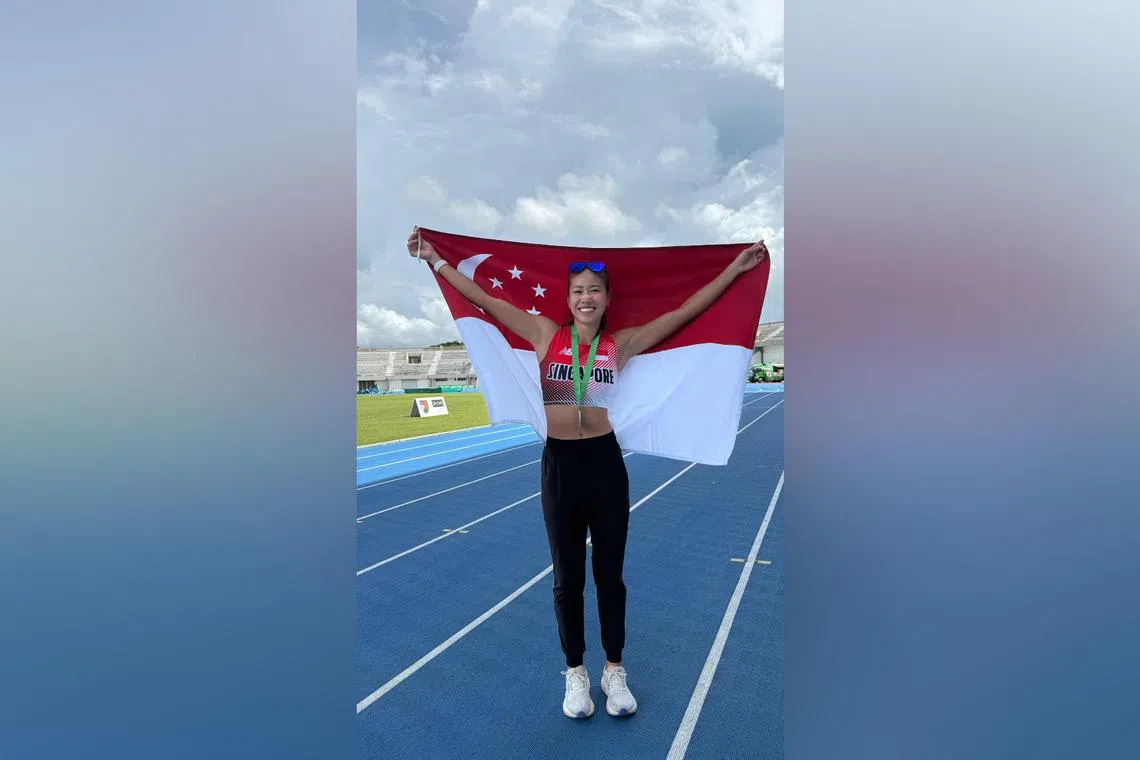 Kerstin Ong with the Singapore flag at the Stadium Tuanku Syed Putra in Perlis, Malaysia, on Aug 30.