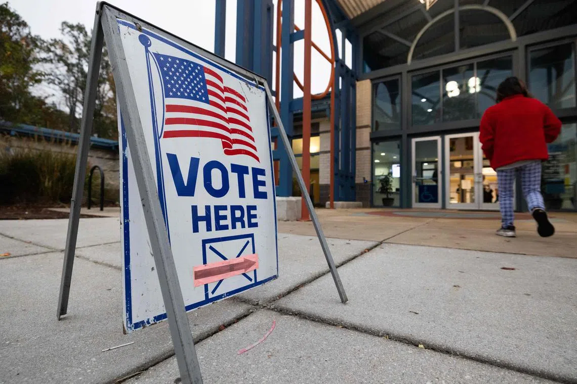 A voter entering a polling station in Norcross, Georgia, on Nov 5. At least two polling sites in Georgia were briefly evacuated in Fulton County.