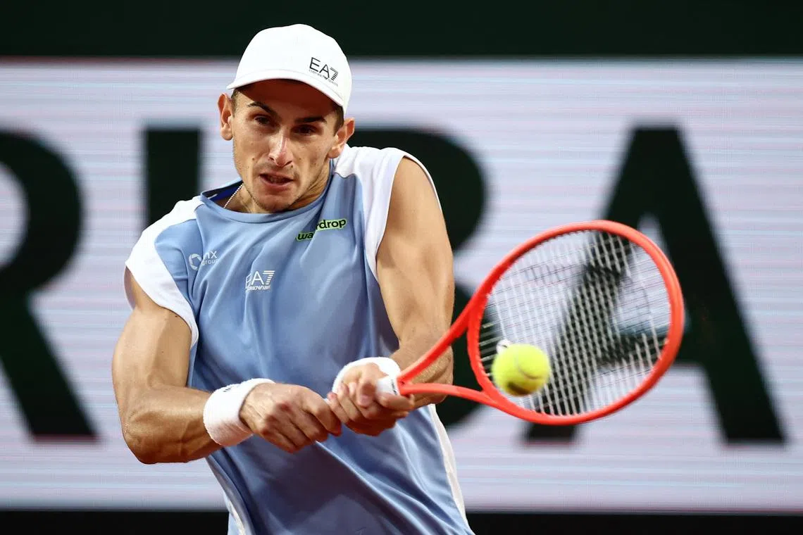 Tennis - French Open - Roland Garros, Paris, France - June 1, 2026 Italy's Matteo Arnaldi in action during his fourth round match against Frances Tiafoe of the U.S. REUTERS/Guglielmo Mangiapane