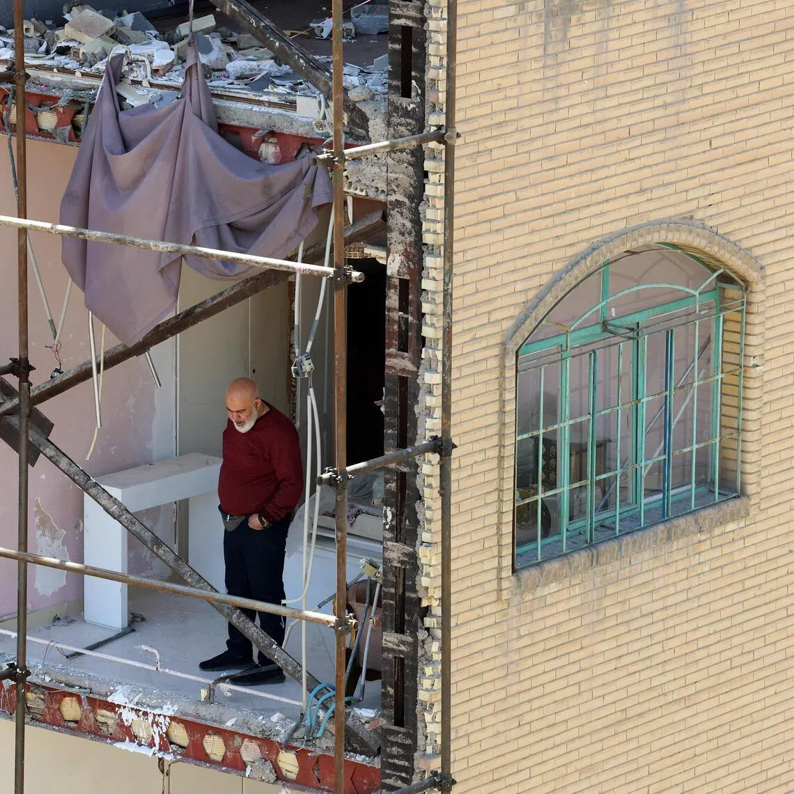 A residential building destroyed by US-Israeli air strikes in southern Tehran on April 14. US and Iranian officials were weighing a return to Pakistan for further talks as early as April 18.