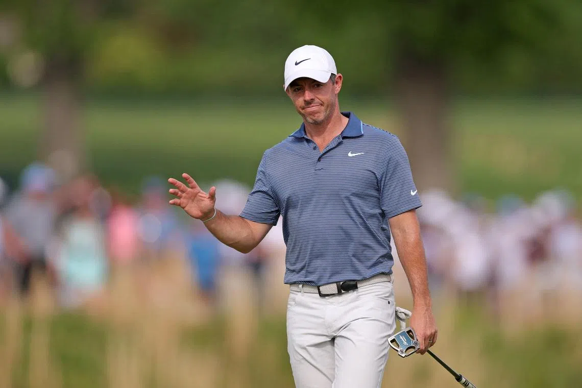 Rory McIlroy of Northern Ireland acknowledging the crowd as he walks up the 18th hole during the final round of the Truist Championship 2025 at The Wissahickon at Philadelphia Cricket Club on May 11, 2025, in Flourtown, Pennsylvania.   