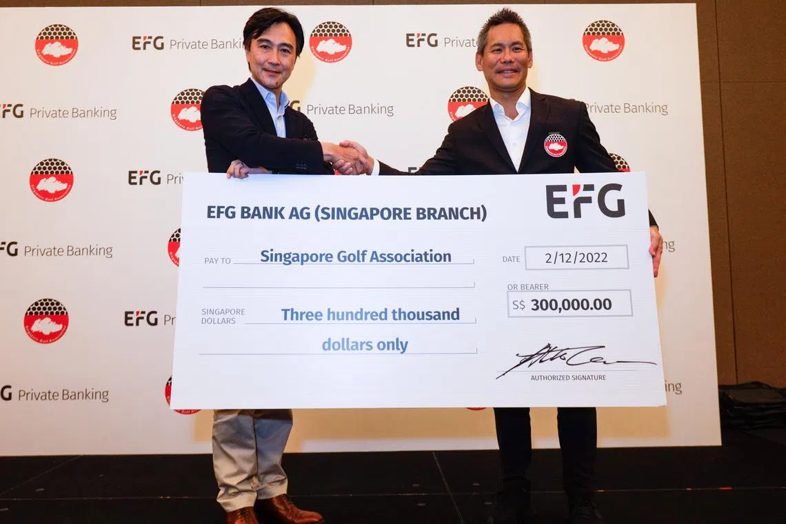 Albert Chiu, executive chairman of EFG bank for the Asia Pacific region (left) and Ivan Chua, SGA vice-president, at a signing ceremony for the partnership between the Singapore Golf Association and EFG Bank AG on Dec 2.