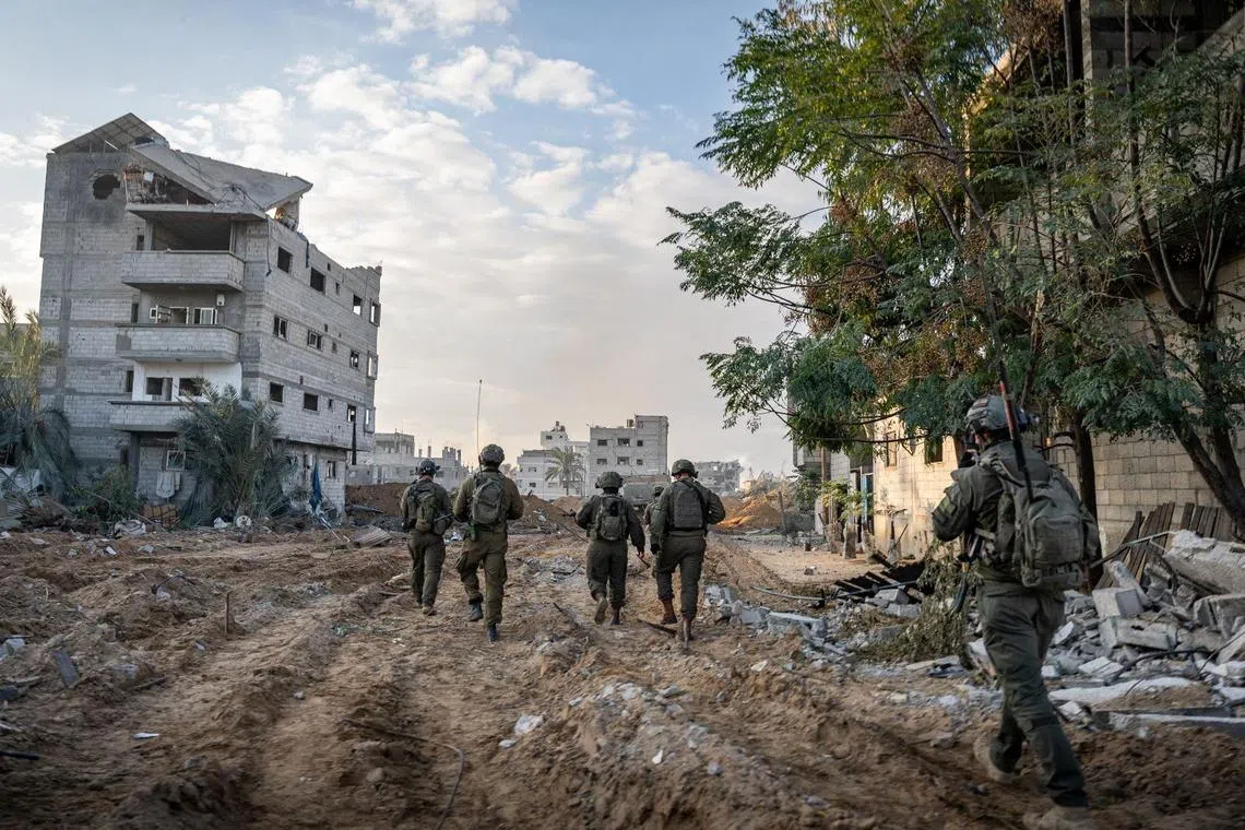 Israeli soldiers operate in the Gaza Strip amid the ongoing conflict between Israel and the Palestinian Islamist group Hamas.