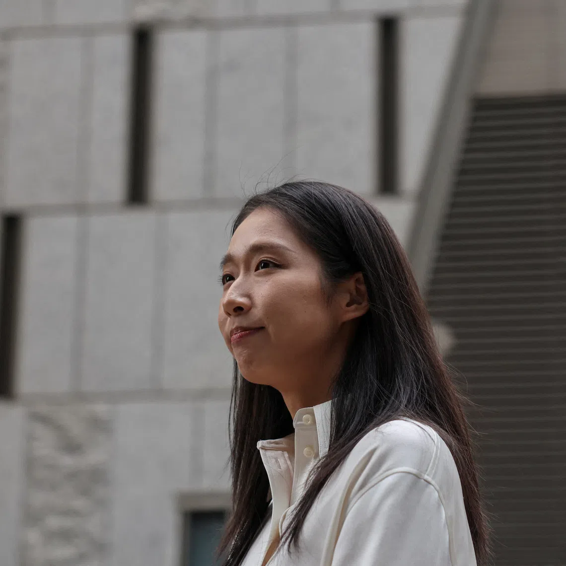 Hong Kong Olympic gold medallist Vivian Kong looks on as she speaks to the media before submitting her nomination form to run for the tourism functional constituency in the Legislative Council election, in Hong Kong, China, November 3, 2025. REUTERS/Tyrone Siu