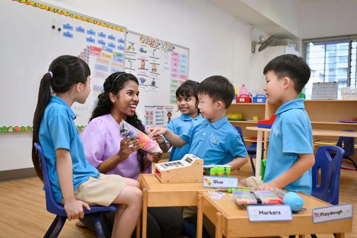 Children at MOE Kindergarten develop social skills and creativity through role-play activities, such as running a stationery shop.
