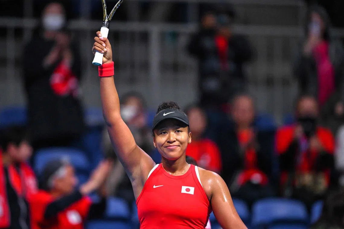 Japan’s Naomi Osaka celebrates her victory against Kazakhstan’s Yulia Putintseva.