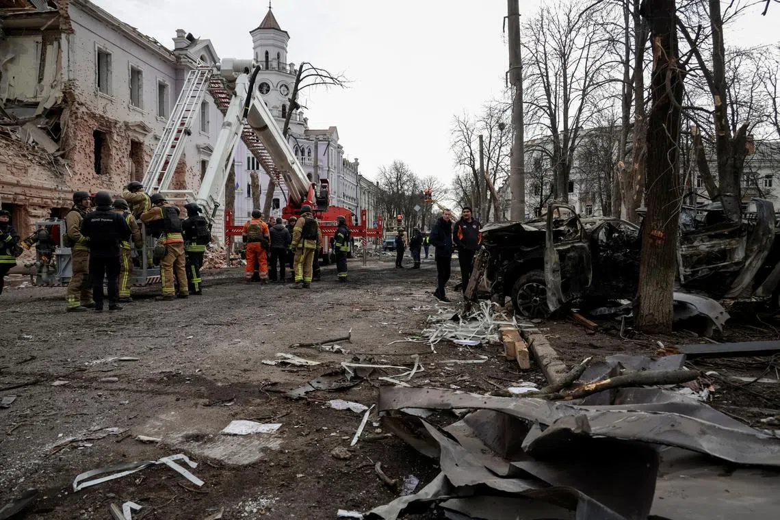 Members of emergency services work at the site of a Russian missile strike, amid Russia's attack on Ukraine, in Sumy, Ukraine April 13, 2025. REUTERS/Sofiia Gatilova/File Photo