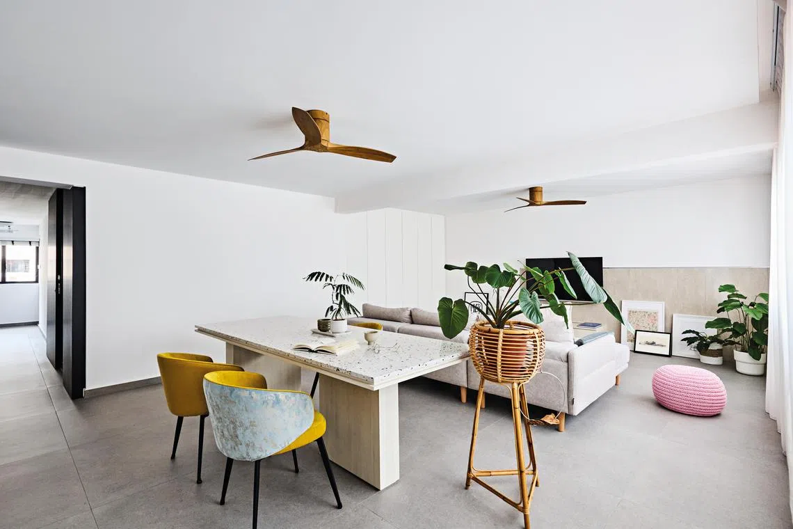 Interior of a four-room HDB flat at Serangoon North Avenue 1. The home reflects homeowner Miss Chew’s preference for a consistently neutral colour scheme and matte finishes.
