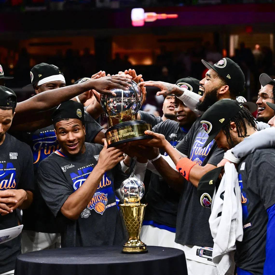 May 25, 2026; Cleveland, Ohio, USA; New York Knicks lift the 2026 Eastern Conference trophy after defeating the Cleveland Cavaliers in game four of the eastern conference finals for the 2026 NBA playoffs at Rocket Arena. Mandatory Credit: Ken Blaze-Imagn Images