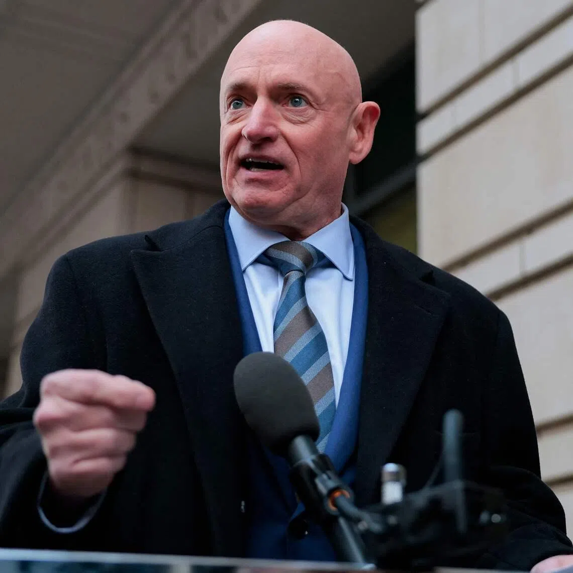 Senator Mark Kelly speaks after departing federal court on Feb 3.