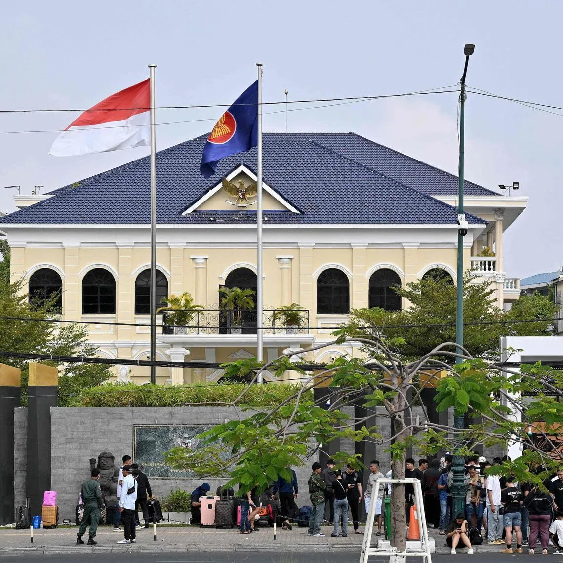 People gather in front of the Indonesian Embassy in Phnom Penh on Jan 19.