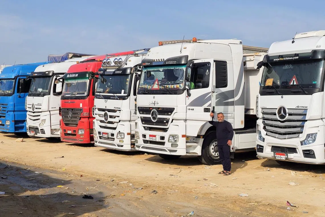 Trucks in Al Arish, Egypt, carrying aid and waiting to cross into the Gaza Strip on Jan 16.