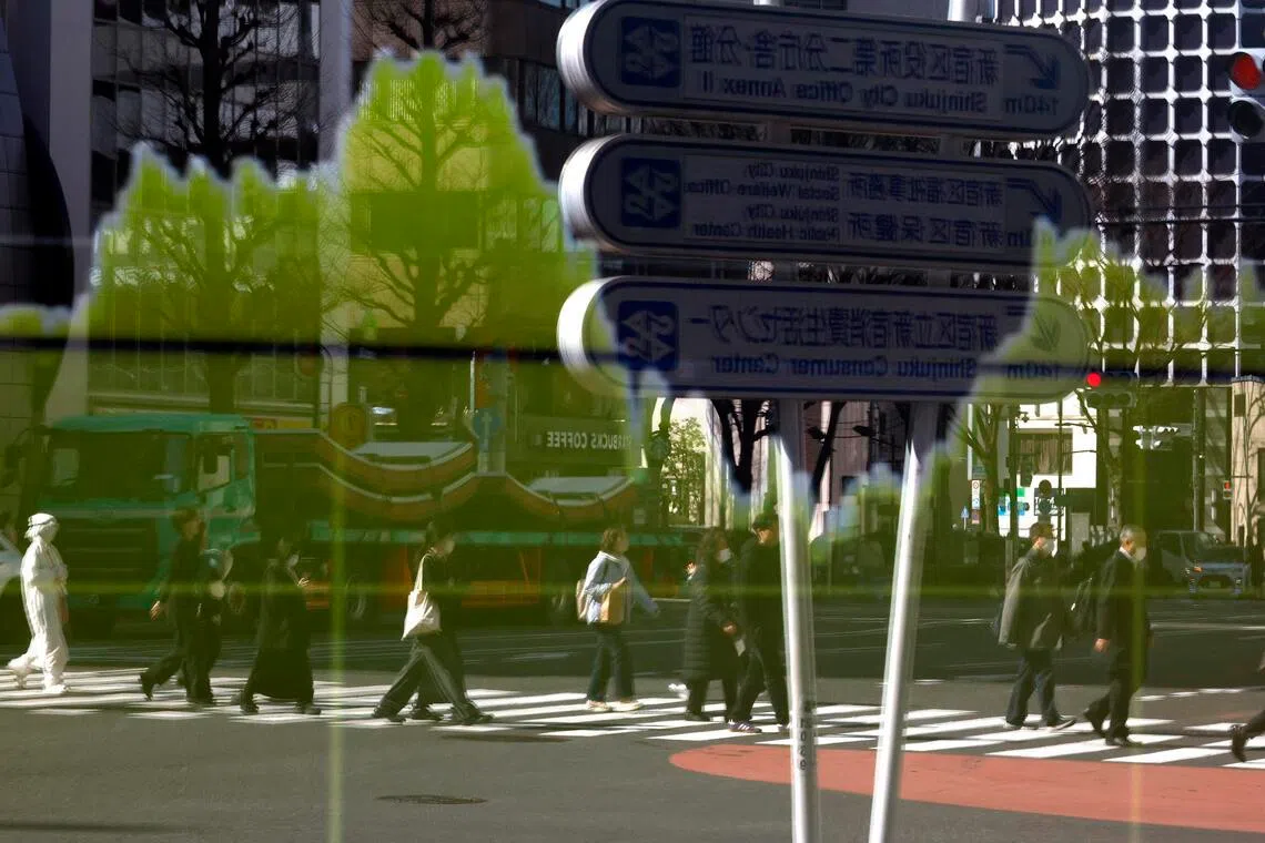 A stock market indicator board in Tokyo, Japan on March 12.