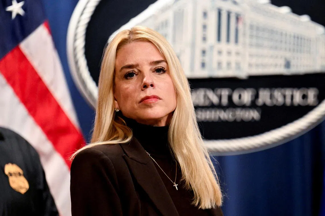 FILE PHOTO: U.S. Attorney General Pam Bondi looks on during her first press conference at the Justice Department in Washington, D.C., U.S., February 12, 2025. REUTERS/Craig Hudson/File Photo