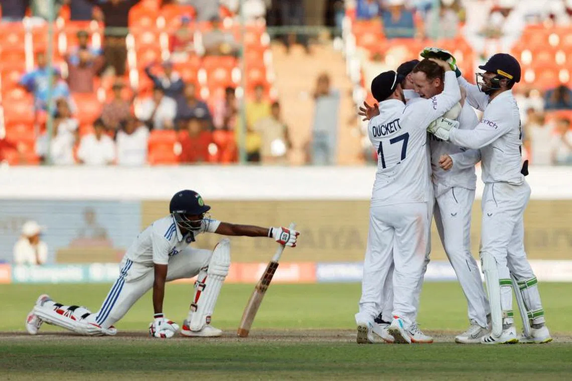 FILE PHOTO: Cricket - First Test - India v England - Rajiv Gandhi International Stadium, Hyderabad, India - January 28, 2024 England's Tom Hartley celebrates with teammates after taking the wicket of India's Srikar Bharat REUTERS/Francis Mascarenhas/File Photo