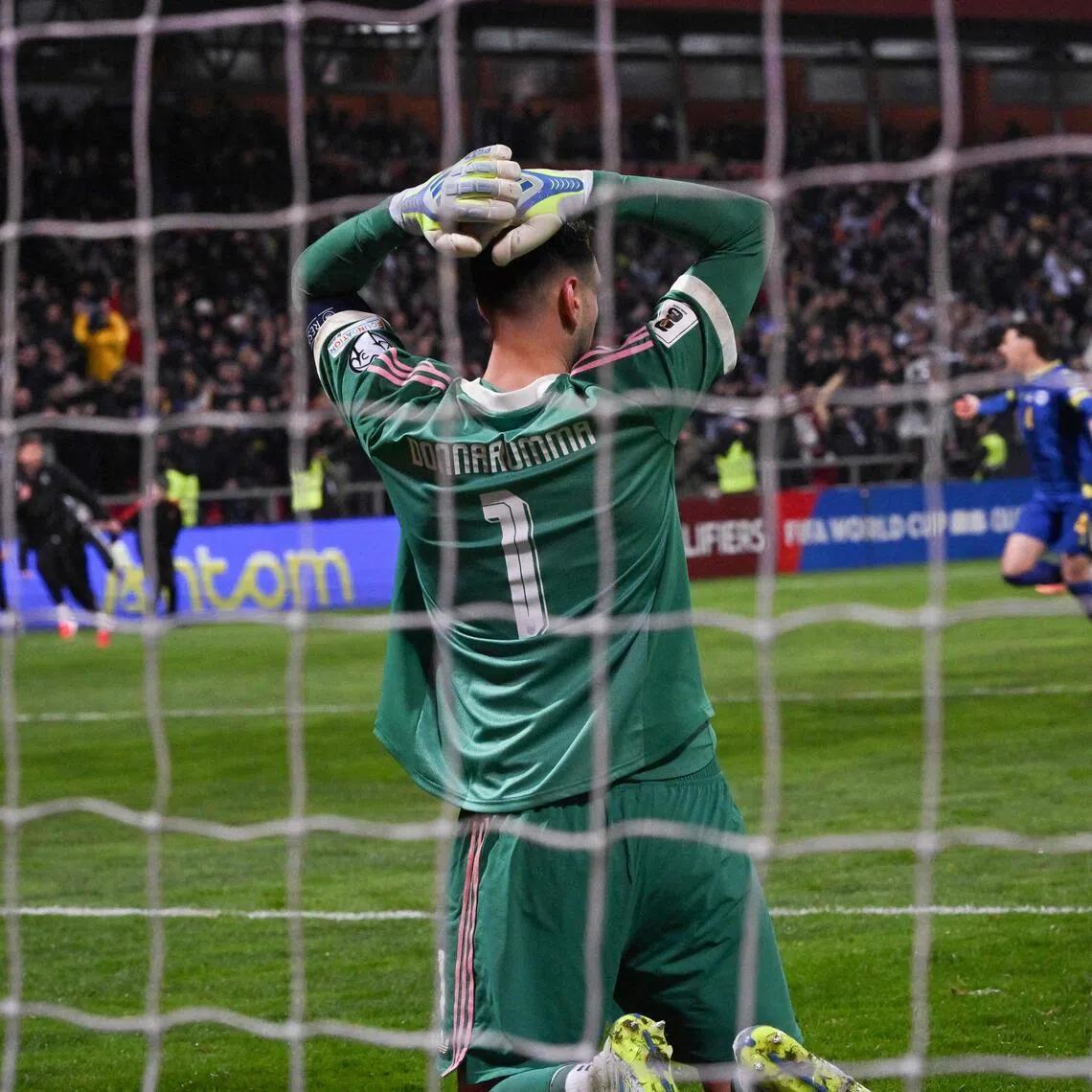 Italy's goalkeeper Gianluigi Donnarumma reacting after the 4-1 penalty shoot-out defeat by Bosnia and Herzegovina at the Bilino-Polje stadium in Zenica on March 31, 2026. The match ended 1-1 after extra time.