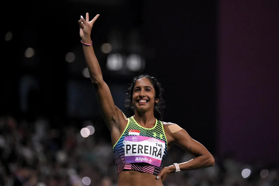 Shanti Pereira of Singapore reacts after her silver medal placing at the 19th Asian Games Athletics Women’s 100m final at the Hangzhou Olympic Sports Centre Stadium on Sept 30, 2023.